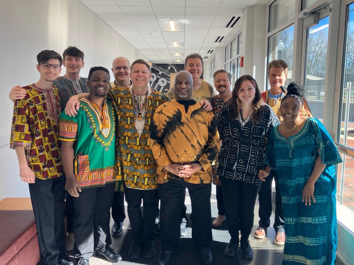 Performers pose for a photo in the Music Building